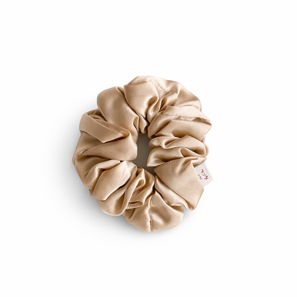 Jazz La Moie almond milk mulberry silk scrunchie with soft shine and gentle hair-friendly finish