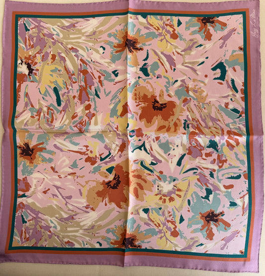 Colorful floral patterned fabric on a plain background Petalia Scarf by Jazz La Moie